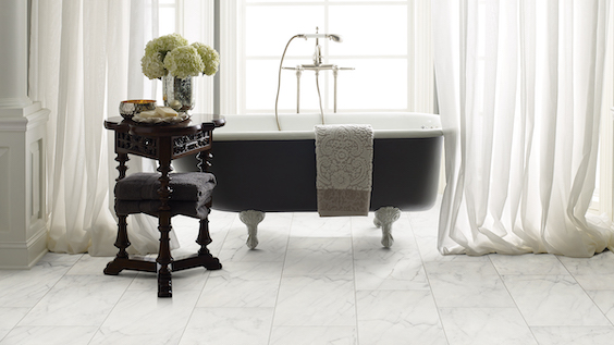 gorgeous porcelain tile flooring in a elegant white bathroom